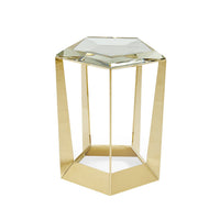 Hexagonal glass accent table with gold frame.