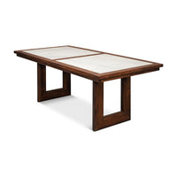 Angled view of dining table, geometric wooden legs.