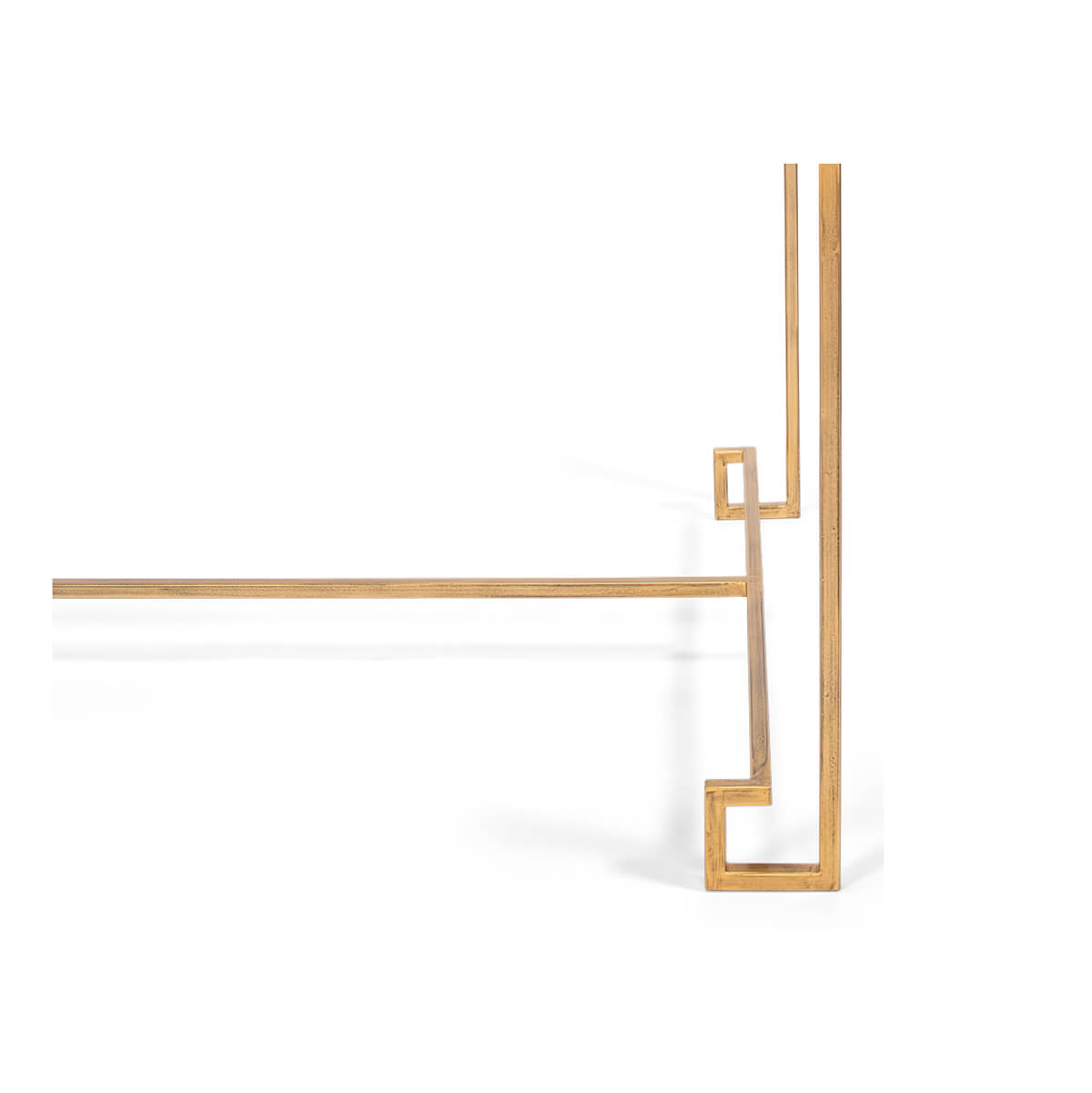 Side structure of cocktail table's gold frame.