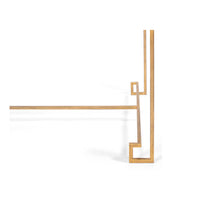 Side structure of cocktail table's gold frame.