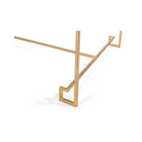 Detailed view of gold base on cocktail table.