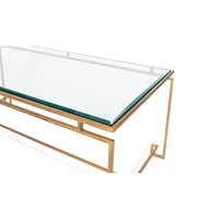 Close-up of glass edge on cocktail table.