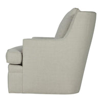 Beige modern armchair with cushion, side view.