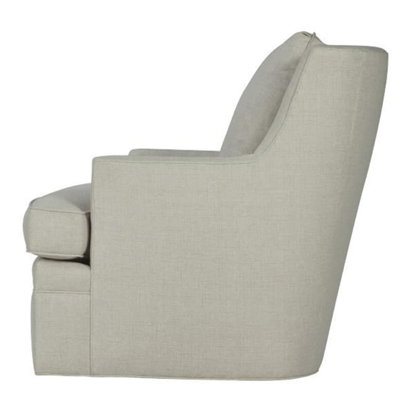 Beige modern armchair with cushion, side view.