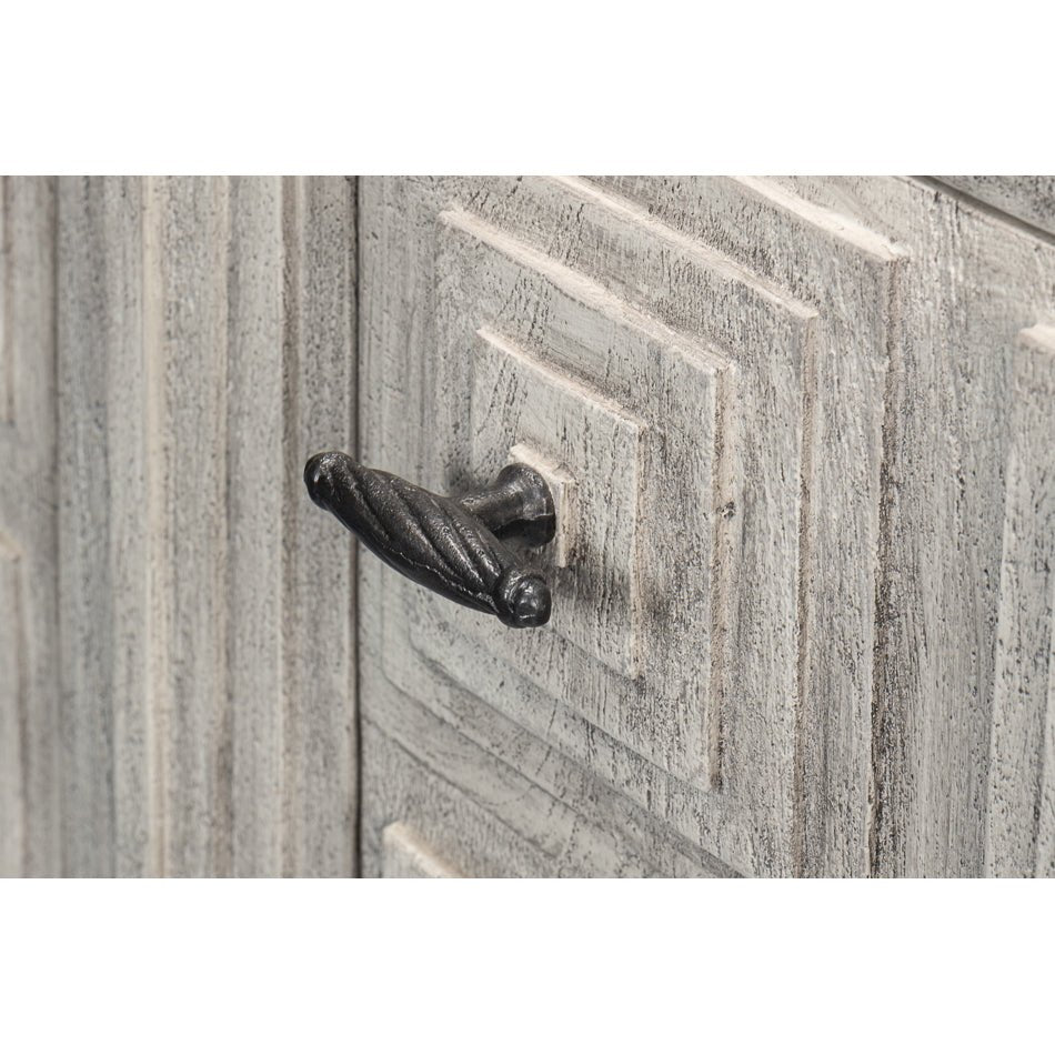 Handle detail on modern gray geometric sideboard.