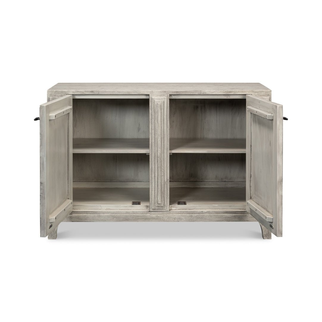 Interior view of modern gray geometric sideboard with doors open.