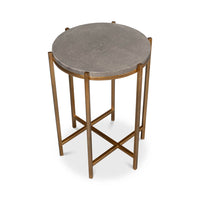 High angle of round accent table, gray leather top.