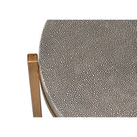 Close-up of gray leather surface on accent table.
