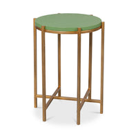 Green leather accent table, angled view.