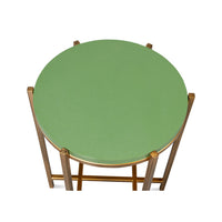 Top view of green leather accent table.