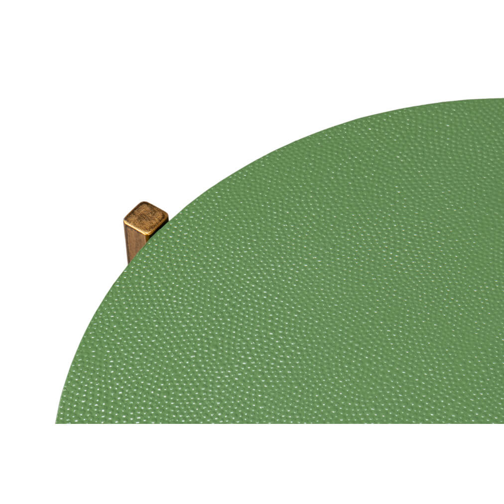 Texture detail of green leather on accent table.