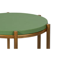 Close-up, green top and legs of accent table.