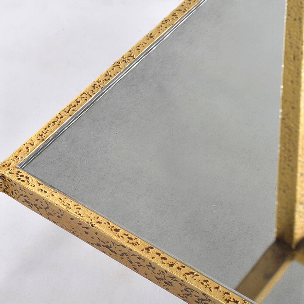 Top corner view of rectangular side table with glass.