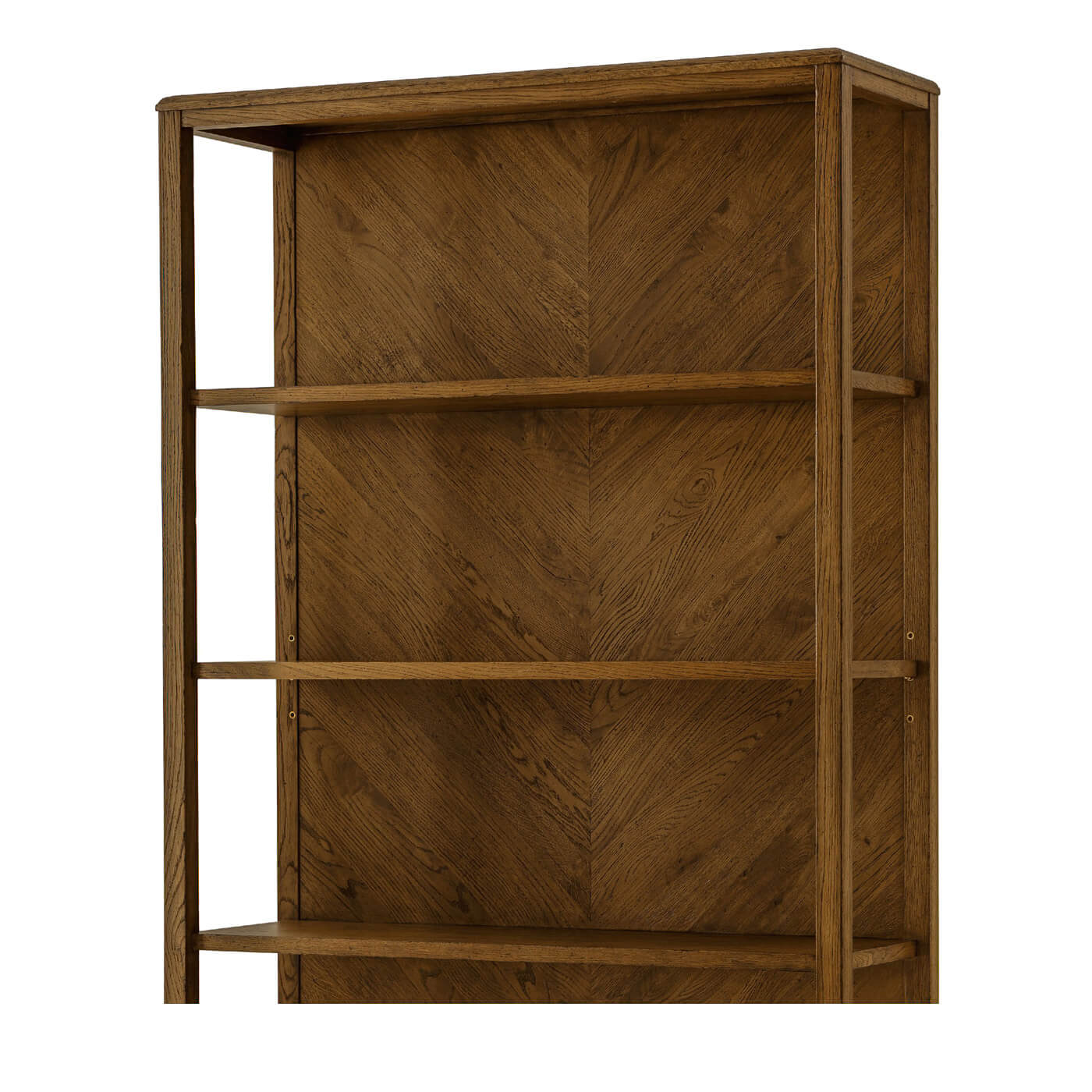 Upper shelves of modern herringbone oak bookcase.