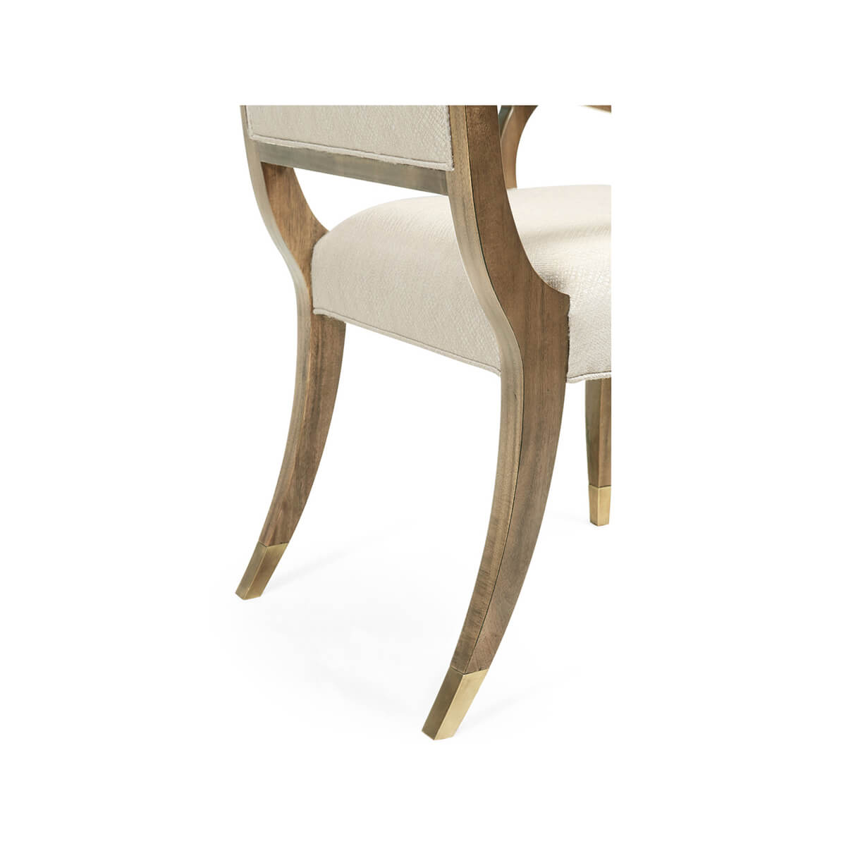 Leg detail on dining armchair, modern high back design.