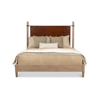 Front view of modern industrial bed with bedding and pillows.