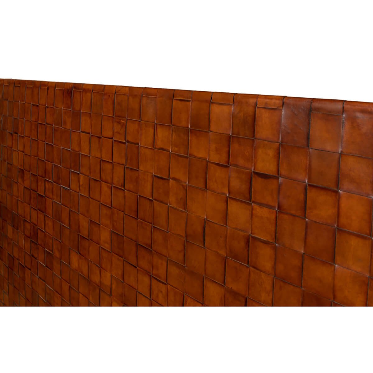 Close-up of woven leather headboard on modern industrial bed.