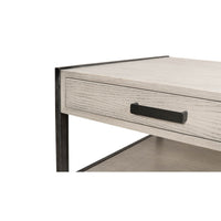 Modern industrial coffee table drawer and handle close-up.