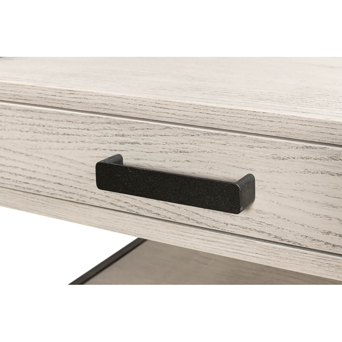 Modern industrial coffee table drawer handle detail.