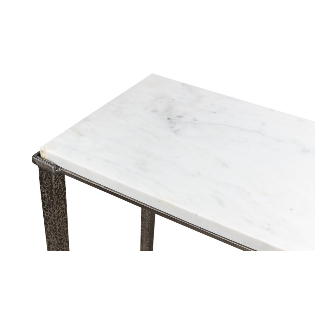 Marble surface detail on console table corner.