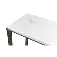 Marble surface detail on console table corner.