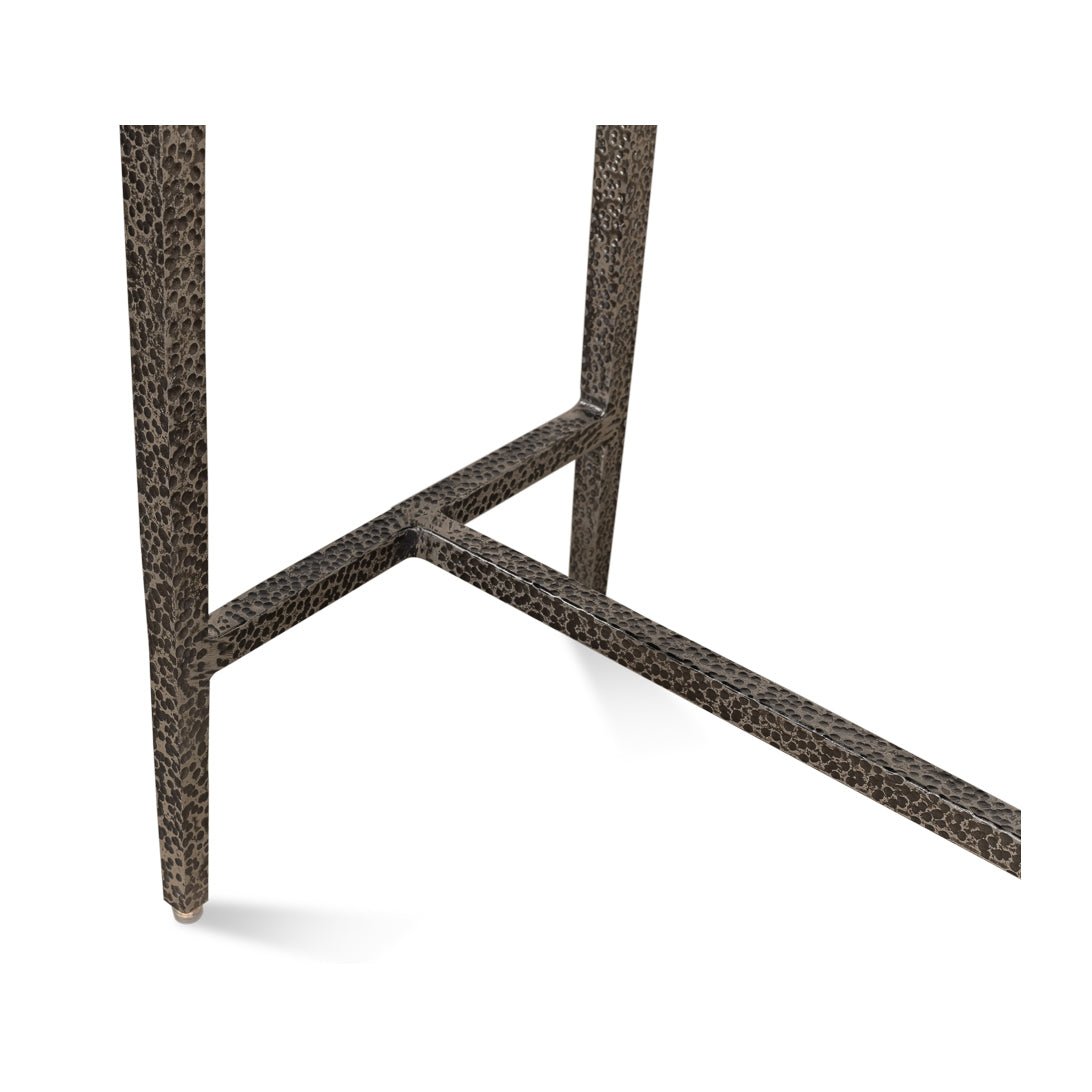 Textured leg detail of console table.