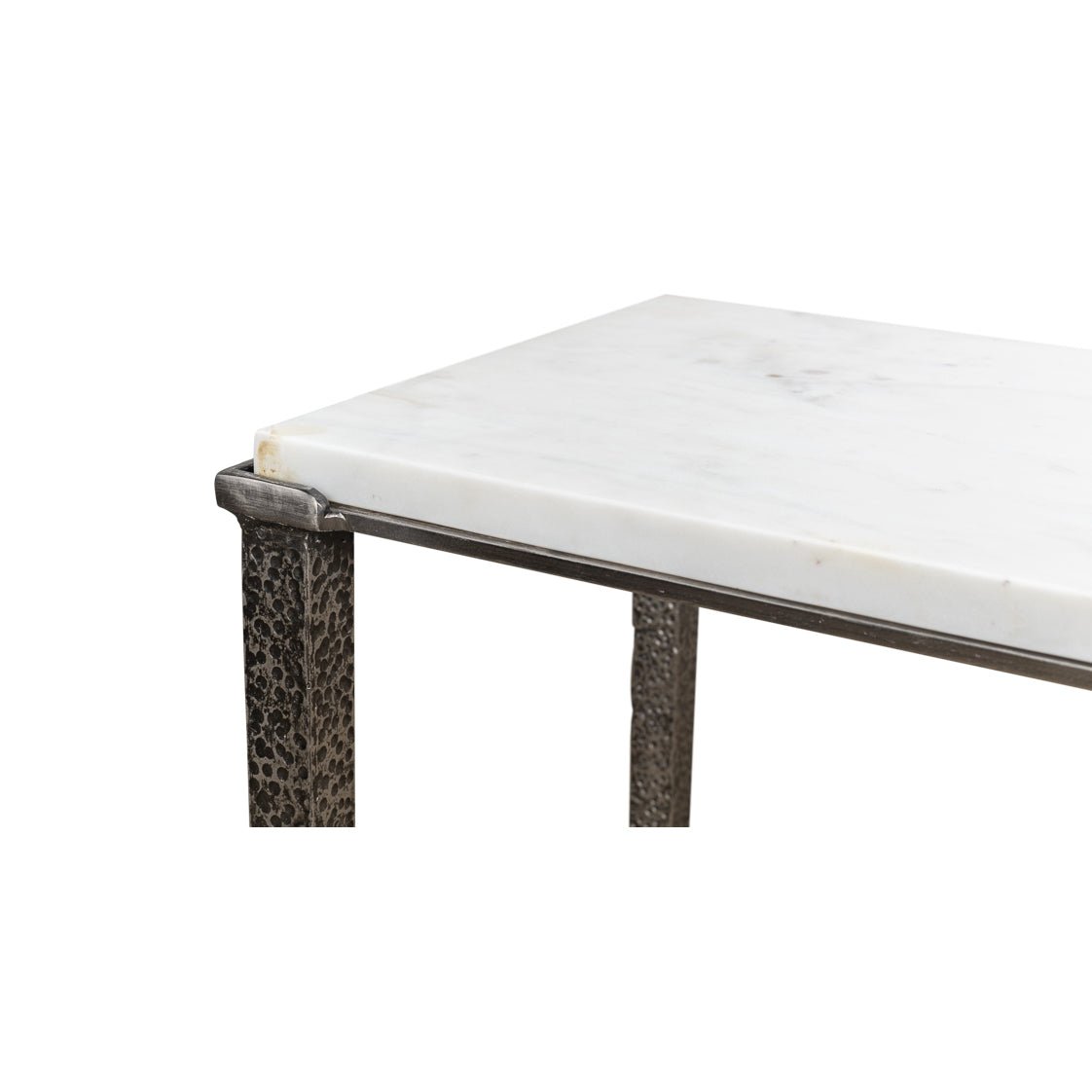 Close-up of console table edge and marble top.