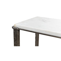 Close-up of console table edge and marble top.