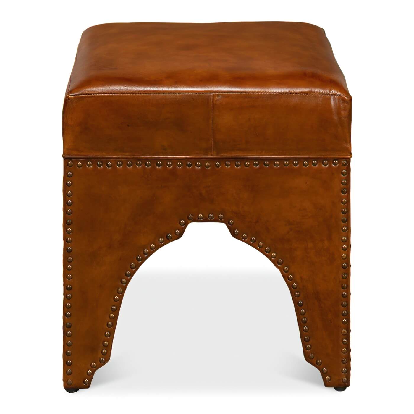 Rear view of ottoman, showcasing leather and rivets.