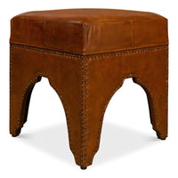 Side angle of stylish brown leather ottoman.