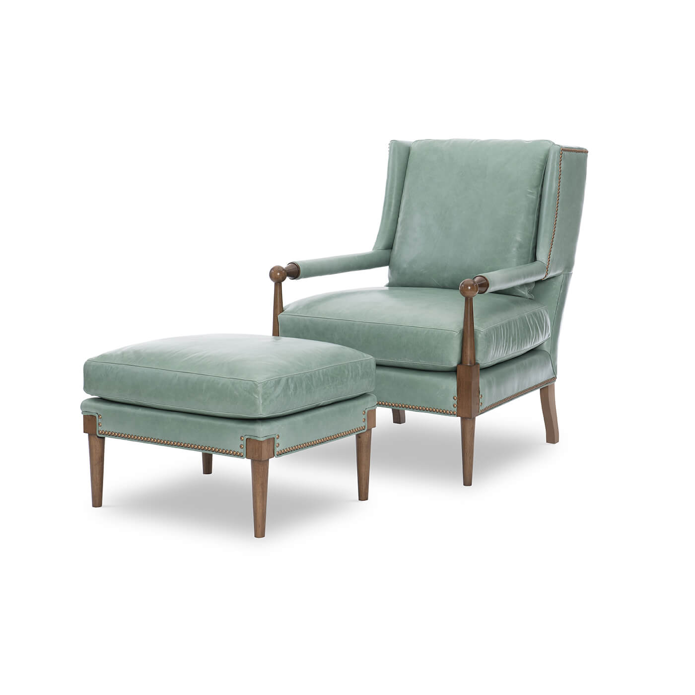 Front view of green leather armchair and ottoman set.