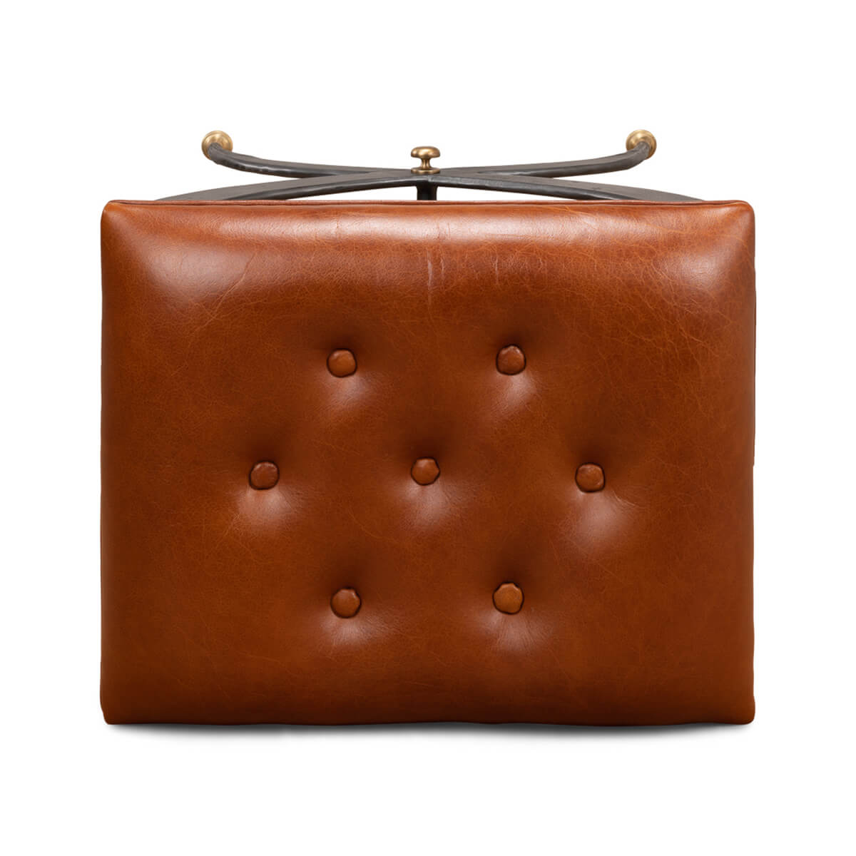 Underside view of stool, tufted leather seat focus.