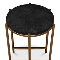 Top-down view of black leather accent table, smooth surface.