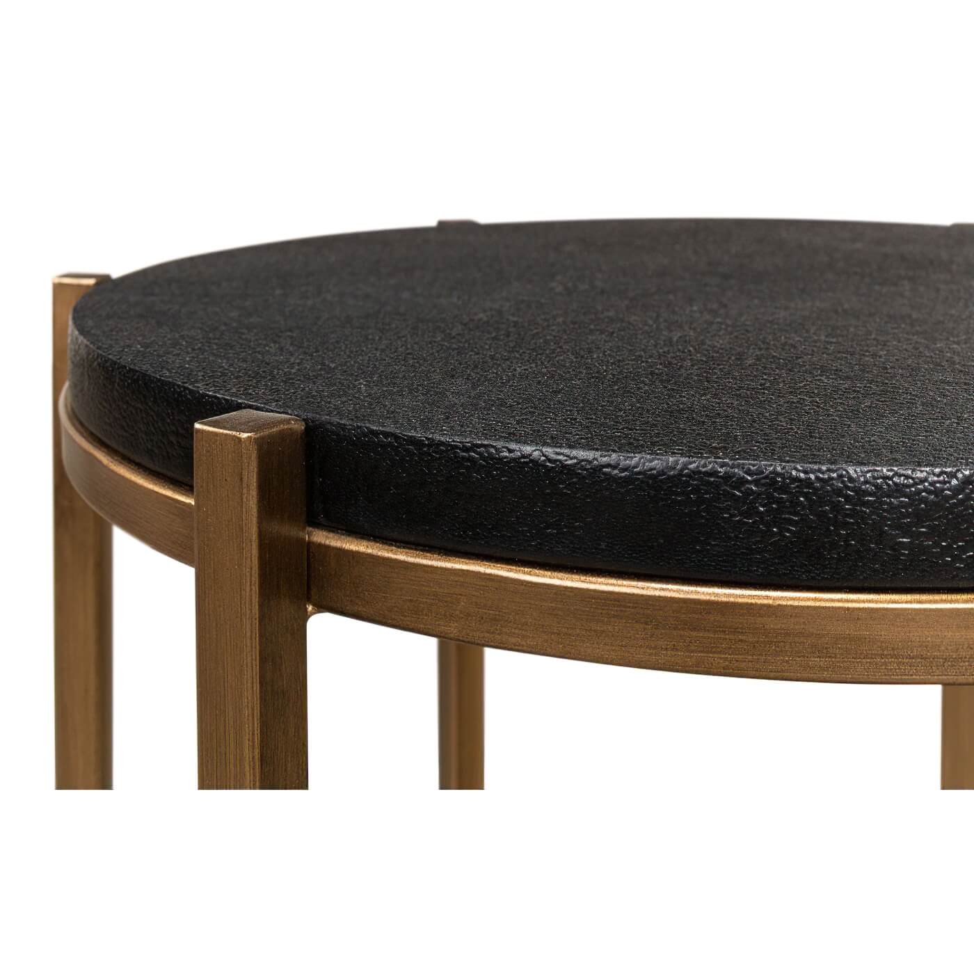 Close-up of black leather top, accent table detail.