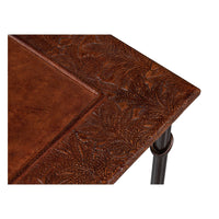 Close-up of leather detailing on nesting table top.
