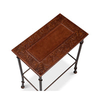 Top view of nesting table, intricate leather design.