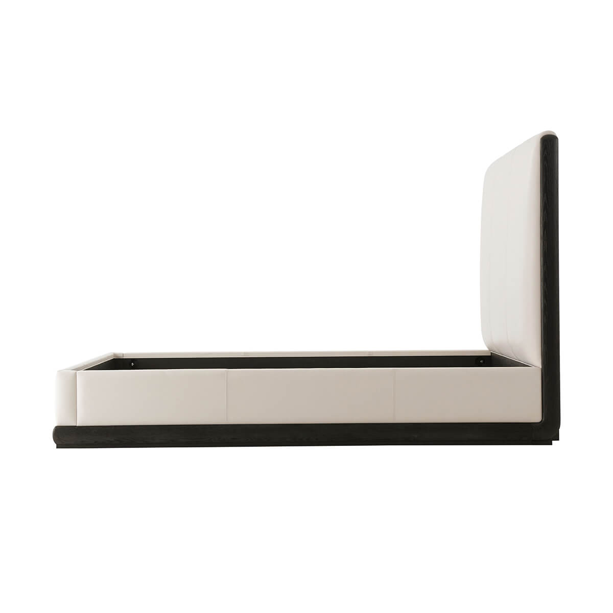 Side view of modern leather upholstered queen bed frame.
