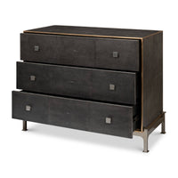 Open drawers on black leather dresser, showing interior design.