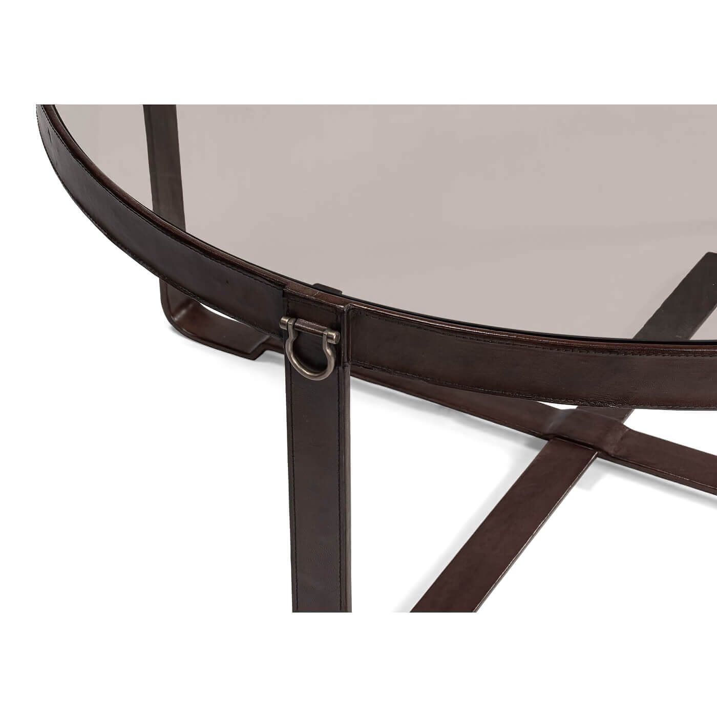 Close-up of leather detail on round coffee table.