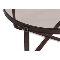Close-up of leather detail on round coffee table.