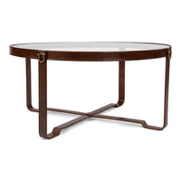 Side view of round coffee table with leather accents.