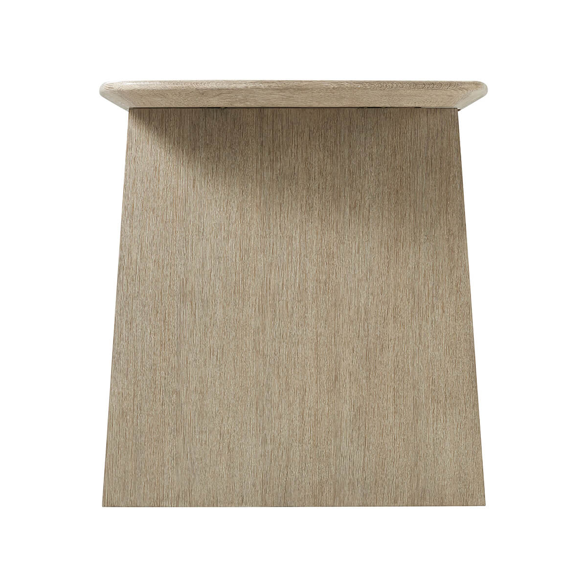 Light oak desk, side view, sturdy tapered base.