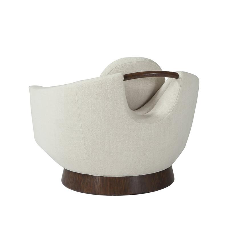 Beige modern lounge chair, rear view showcasing handle.