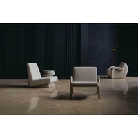 Room setup showcasing modern low accent chairs and decor.