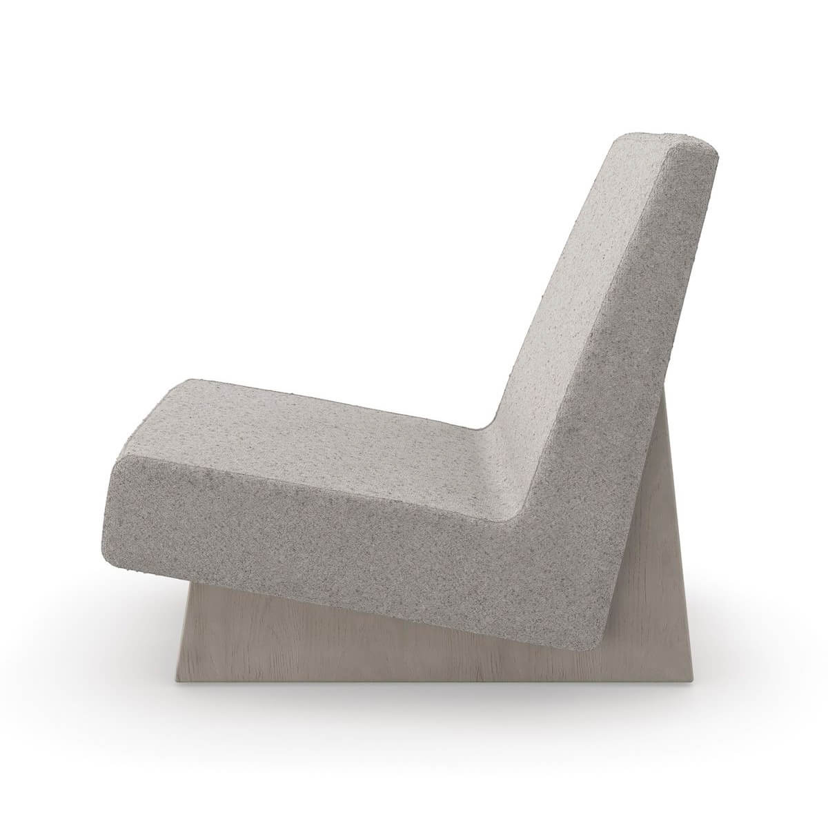 Side profile of modern low accent chair with slanted back.