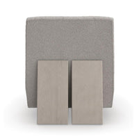 Rear view of modern low accent chair showing structure.