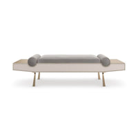 Modern luxury bench, front view, rounded cushions and legs.