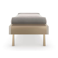 Modern luxury bench, close-up side view, sturdy legs shown.