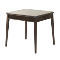 Angled view of modern marble top end table.