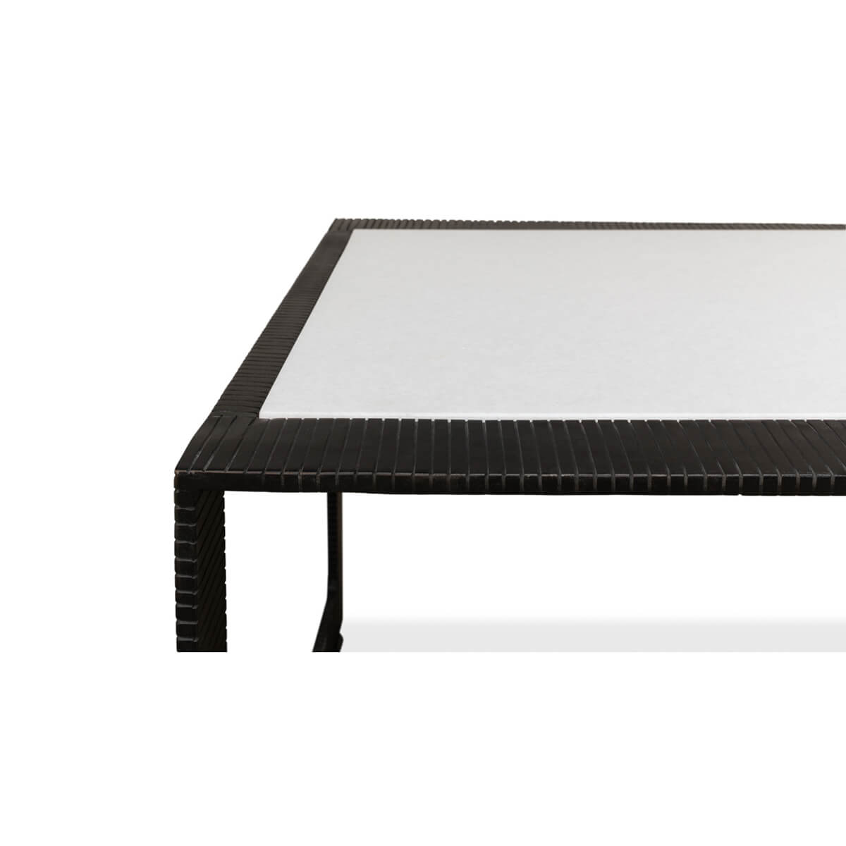 Edge detail of modern marble top iron coffee table.